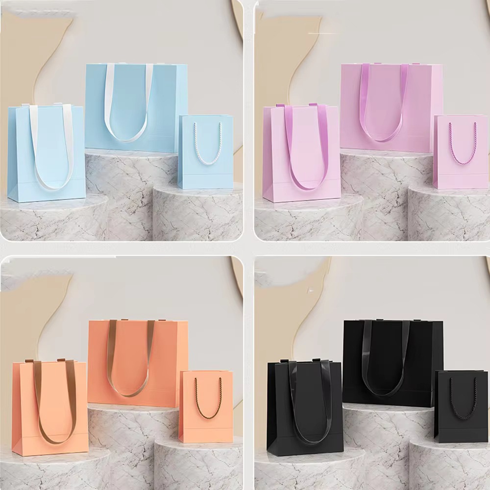 Factory Direct Custom Paper Shopping Bags for Clothing Cosmetic and Retail Packaging