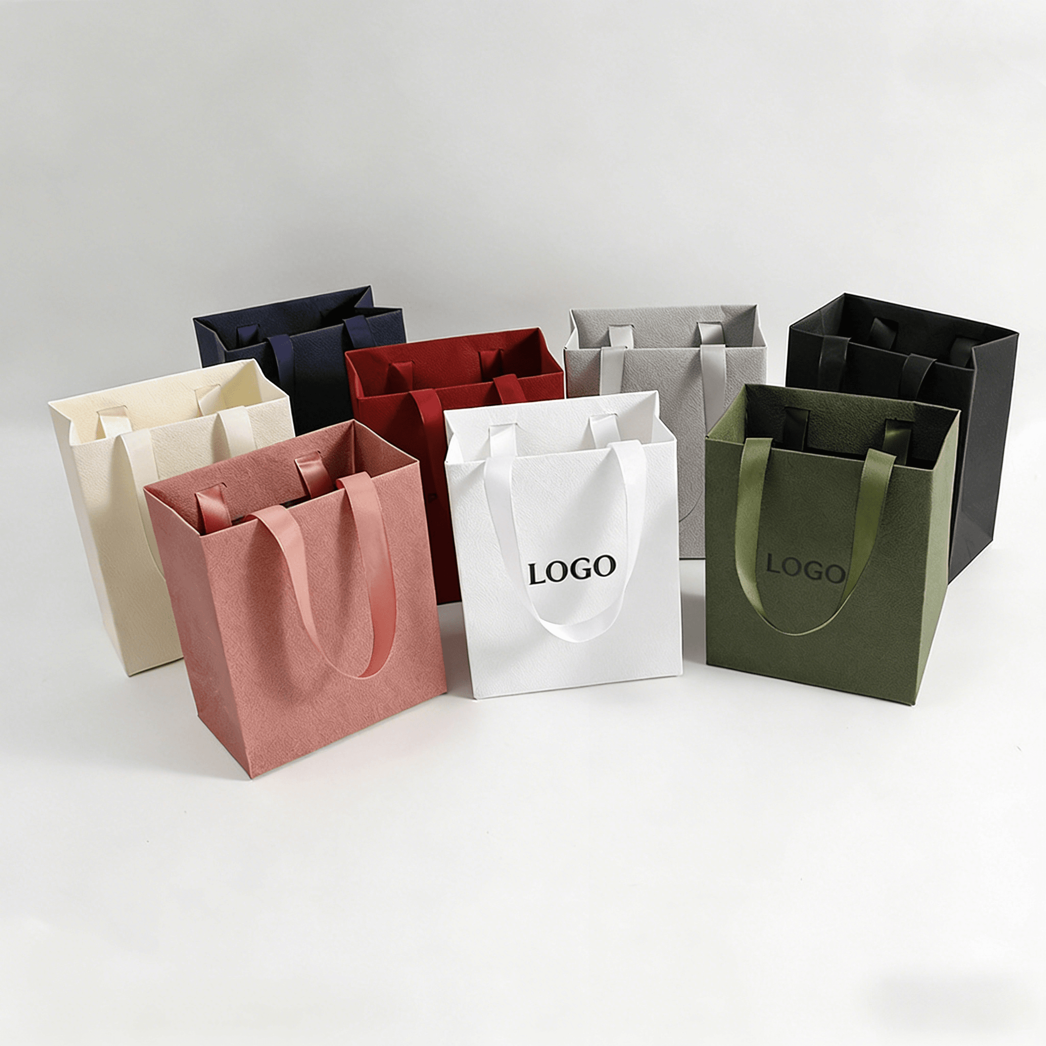 Wholesale Custom Logo Paper Carrier Bags for Boutique Gift and Fashion Packaging